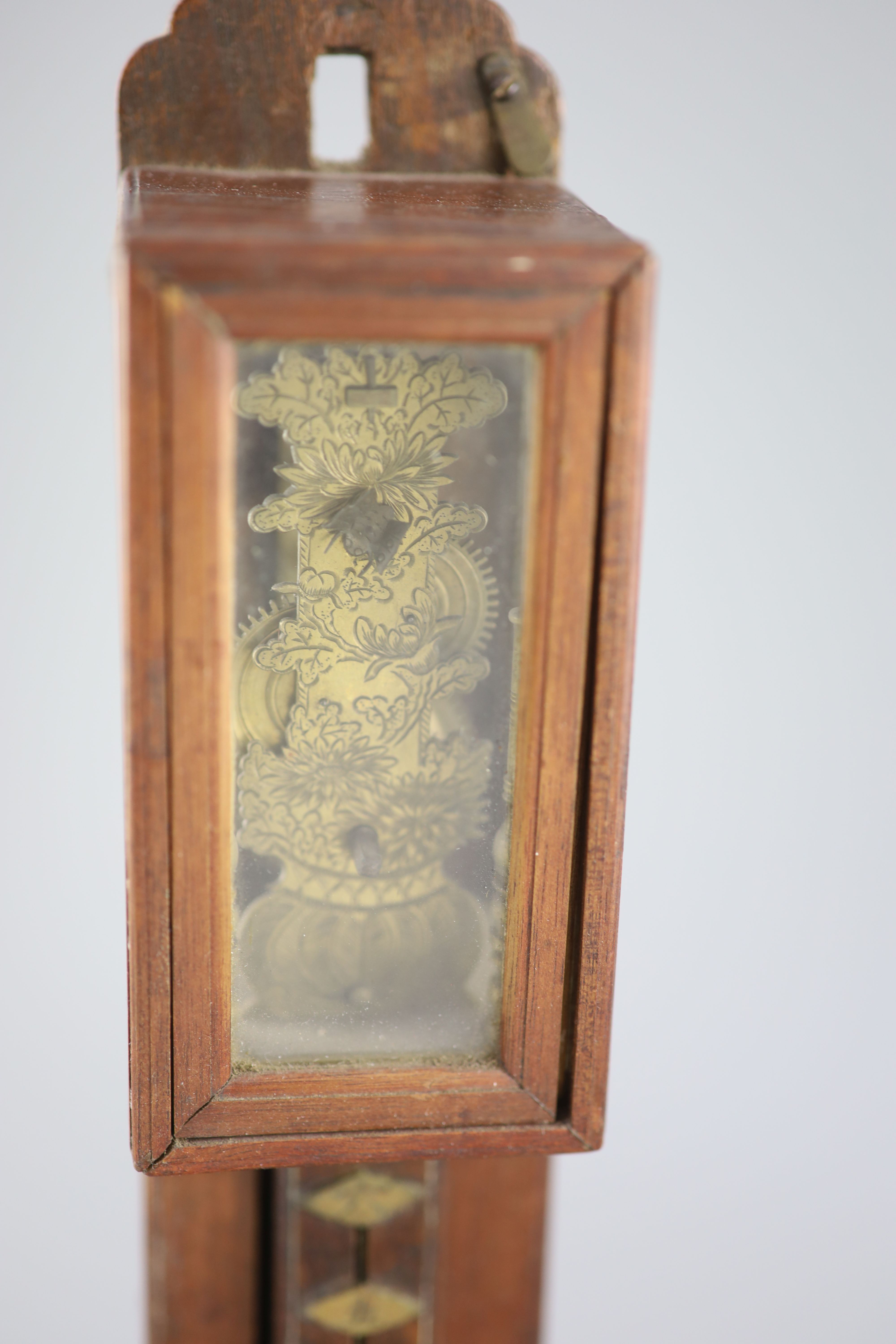 A Japanese shitan wood wall clock, shoku dokei, 19th century, Provenance - A. T. Arber-Cooke